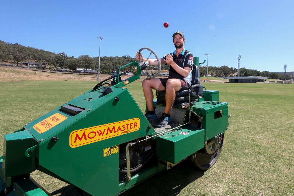 SPEED MACHINE: Lavington's Ryan Brown combines mowing down batsmen with working on Lavington Sportsground's No.2 Oval. Picture: TARA TREWHELLA