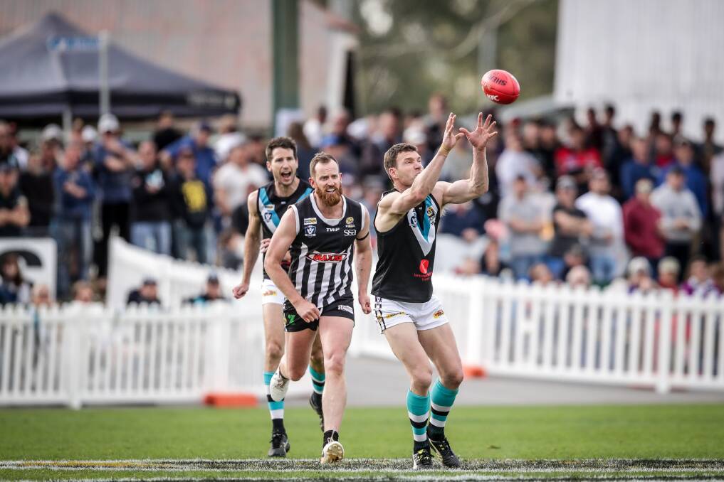 Lavington's Adam Butler is considering retirement after joining the club in 2005. He played in that year's premiership and followed here against Wangaratta in 2019.