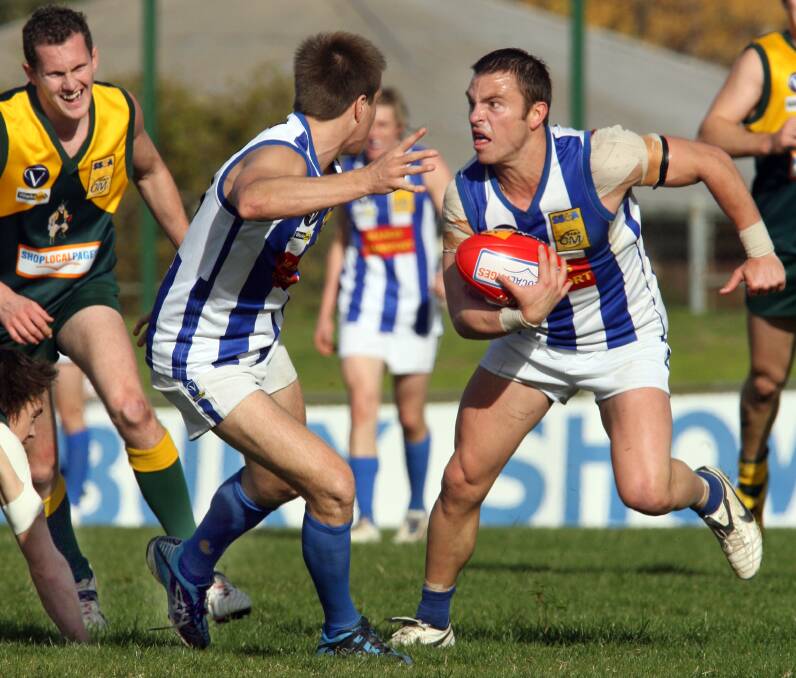 Jake Ryan looks for a team-mate during a game against North Albury in 2008. The tough midfielder made an enormous impact, winning the Morris Medal that year.