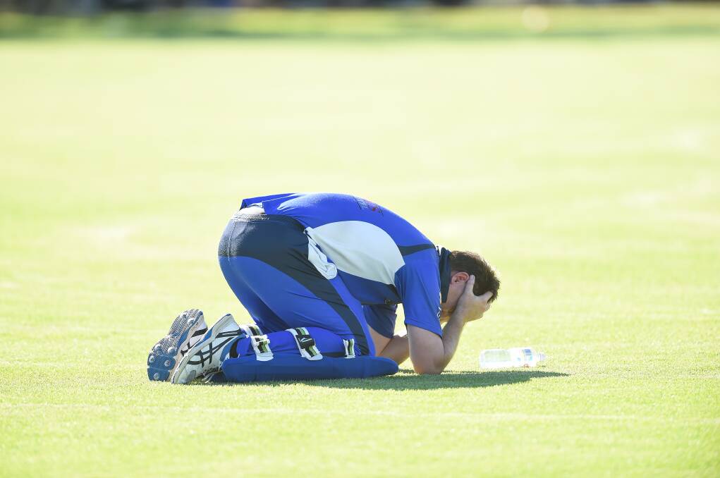 AGONY: Albury's Jerim Hayes is devastated after he fell to leave the fledgling finals side one run short of a grand final berth. Picture: MARK JESSER