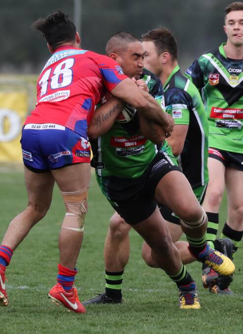 ACTION JACKSON: Thunder's Tuki Jackson looks to smash through the Kangaroos' defence. The home side pipped the Thunder to snatch the last finals spot.