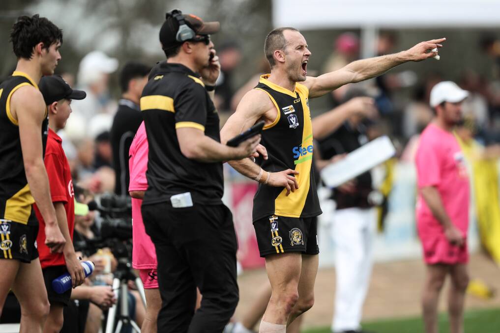 Daniel Cross yells encouragement to his team-mates in the grand final loss to Wangaratta in September.