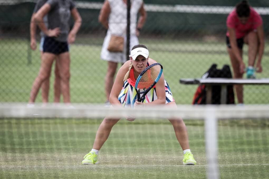 WAITING GAME: The Central Coast's Chloe Costelloe waits to return serve in her semi-final against Sydney's Anne-Marie Medcalf.