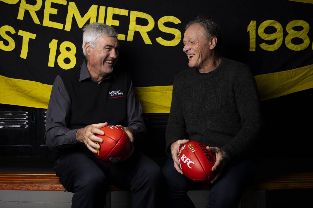 FUN TIMES: Albury 1982 premiership players Rod Coelli (left) and Terry Cross enjoy a few laughs ahead of the 40-year reunion. Picture: ASH SMITH