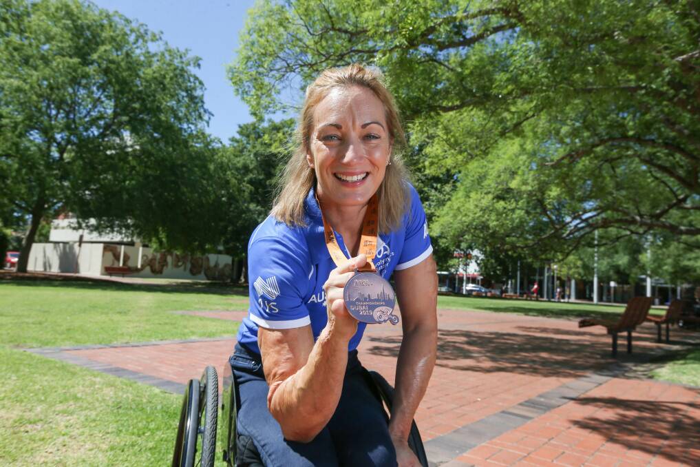 TOP EFFORT: Eliza Ault-Connell has returned home after the World Para Athletics titles. Ault-Connell contracted meningococcal disease in 1997. Picture: TARA TREWHELLA