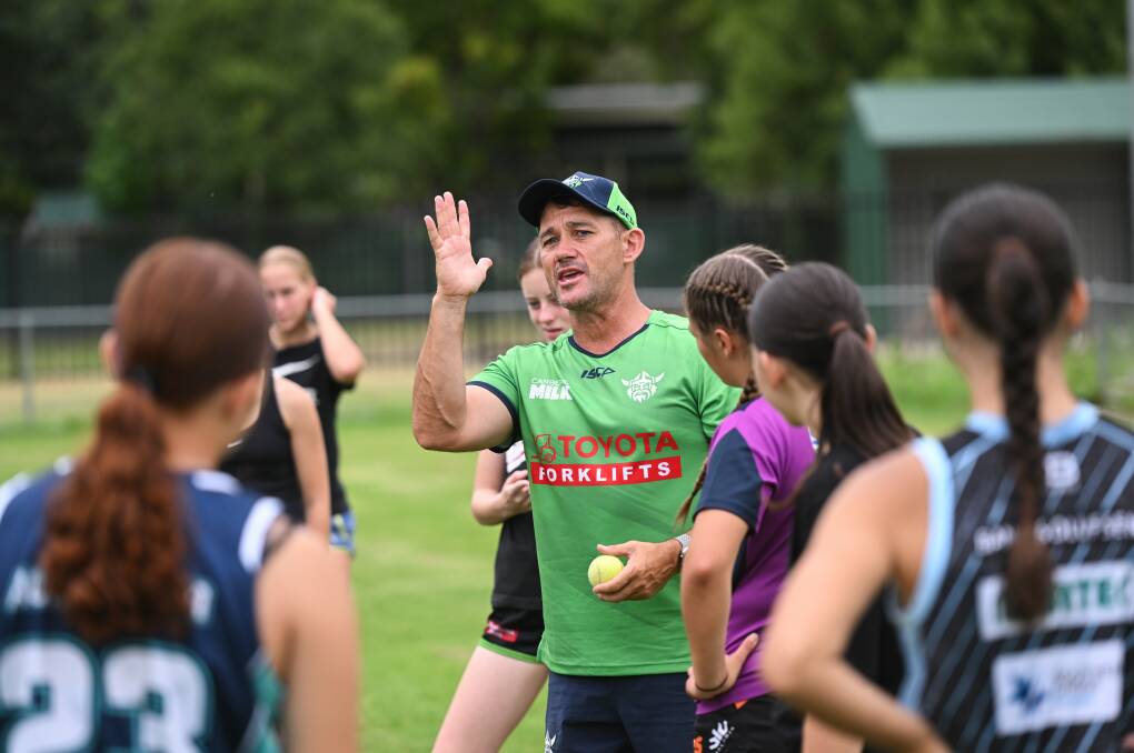 Canberra Raiders' NRLW coach Darrin Borthwick explains a training drill to the players. Picture by Mark Jesser