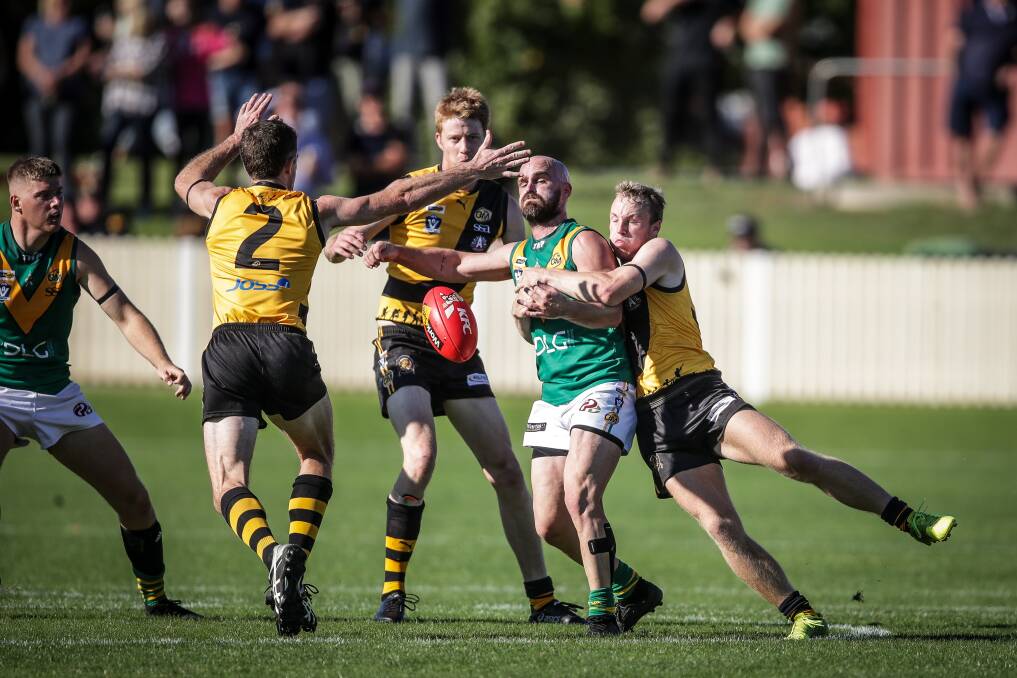 North Albury (with ball) will look totally different from the team which played Albury in the annual Anzac Day clash last year with a host of fresh faces.