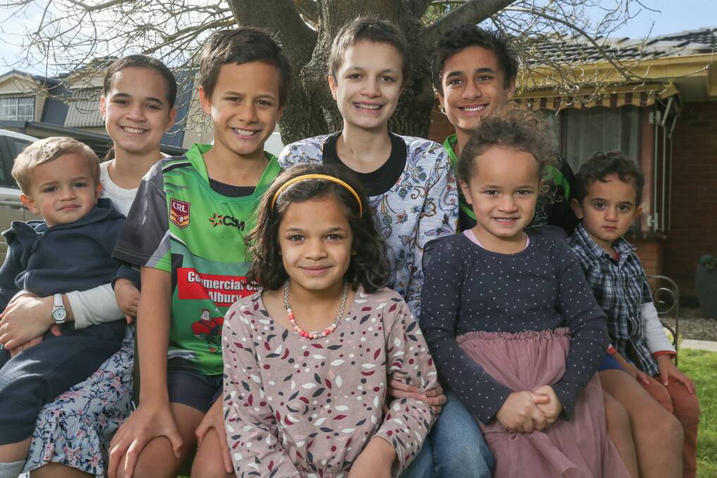CLOSE: Kateri Byrnes, 14 (back, second from right)) with Vincent, 1, Gabrielle, 11, Xavier, 9, Patrick, 13, Emiliana (front) 7, Rosina, 5 and Raphael, 3 