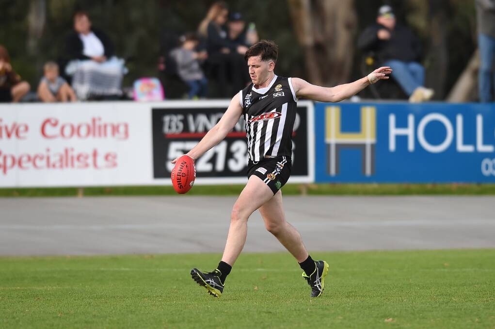 SHOOTOUT: Wangaratta's Josh Porter kicked a goal against the Panthers. He was one of 19 goalkickers for the match, which produced 42 majors. Picture: MARK JESSER