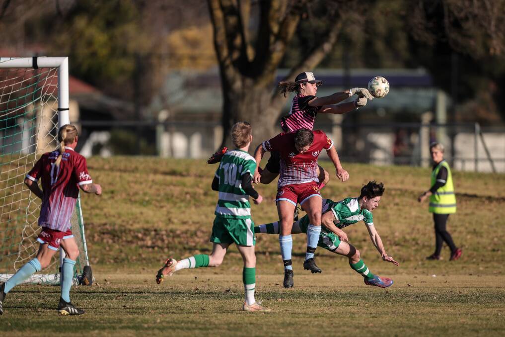 HIGH ALERT: Albury United's defence is under siege as Twin City looks to open the scoring on Sunday. After a scoreless first half, the visitors nabbed the game's two goals in the last 20 minutes. Picture: JAMES WILTSHIRE