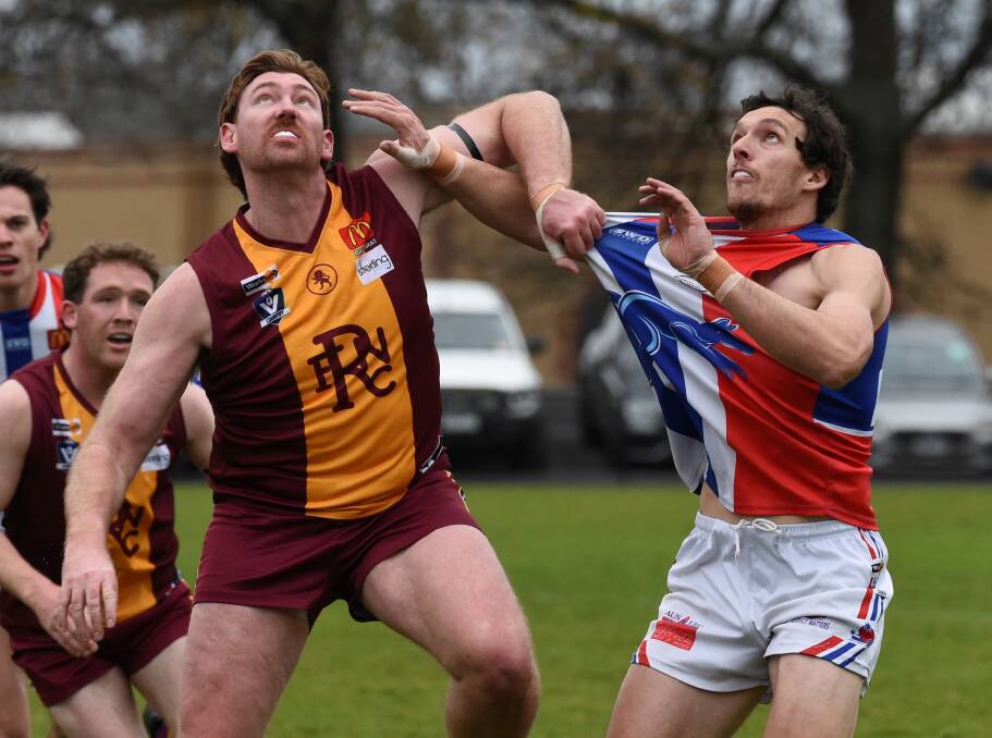 Nathan Dunstan (left) has spent the past two years with Redan in the Ballarat Football League. Picture by Lachlan Bence