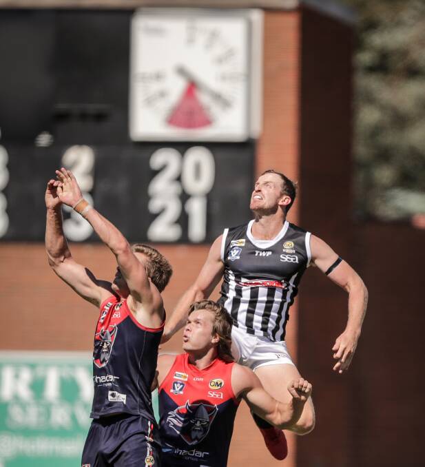 Wangaratta captain Michael Newton has made a habit in recent games against Wodonga Raiders of flying high for marks.
