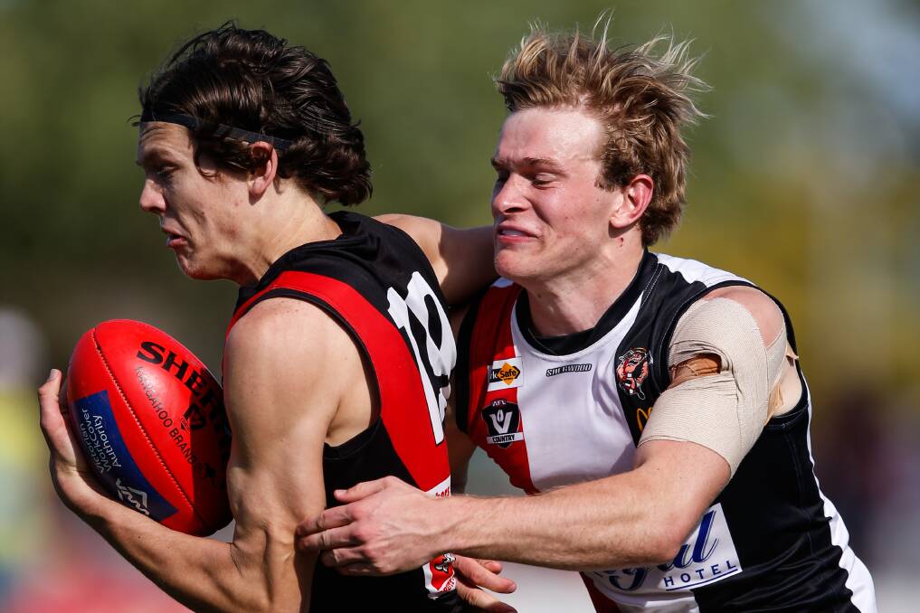 Nick Mellington (right) played in Benalla's 2015 grand final win over Kyabram in the Goulburn Valley Football League.