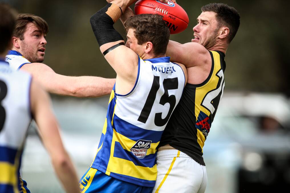 Brayden O'Hara (right) battles against his Goannas' opponent last month, but he should have no battle recovering from a corked calf for the grand final.
