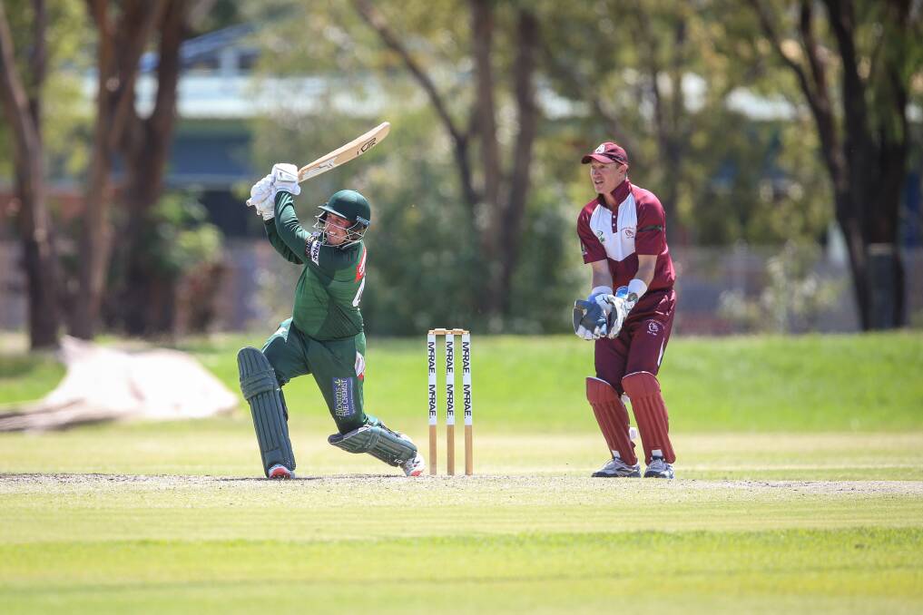 WHACK: Neil Smith hits the boundary which brought up his 50 against Wodonga. It was his fifth half-century this season, along with one ton. Picture: JAMES WILTSHIRE