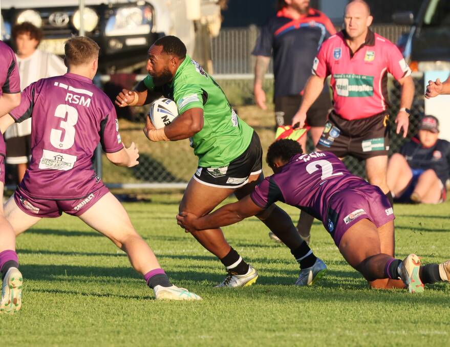 Albury Thunder's Jackins Olam powers ahead against Southcity on Saturday evening. Picture by Les Smith