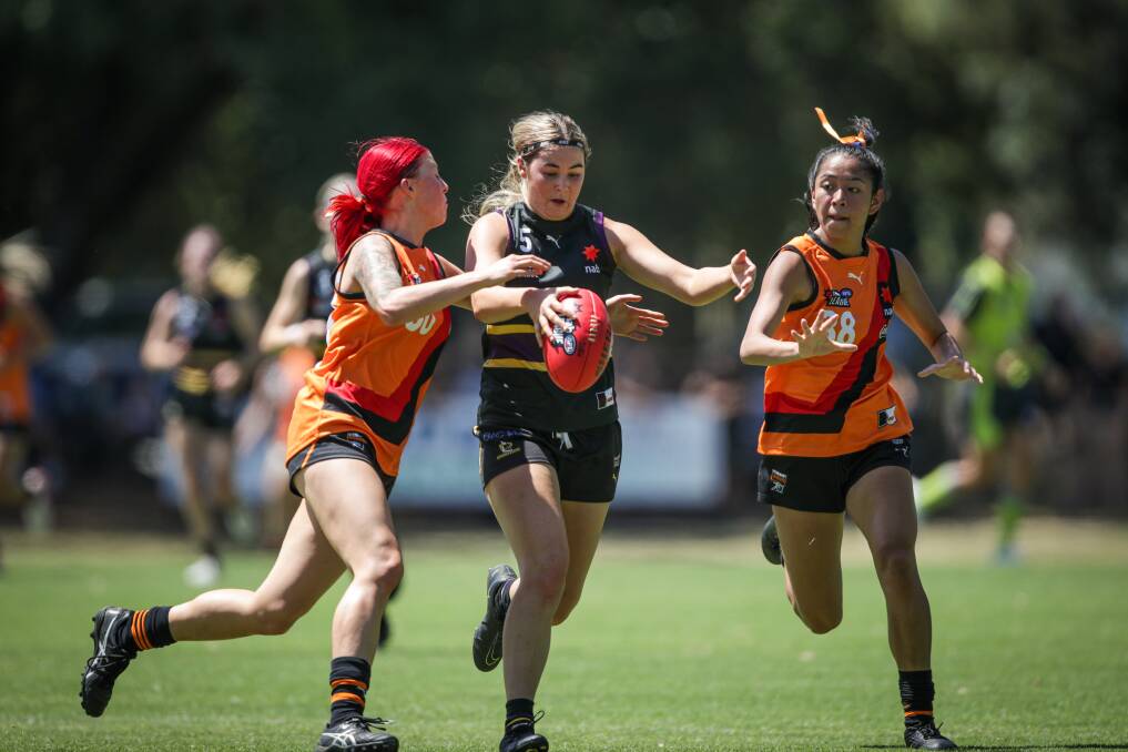 Zarlie Goldsworthy (centre) was picked up in the AFLW Draft.