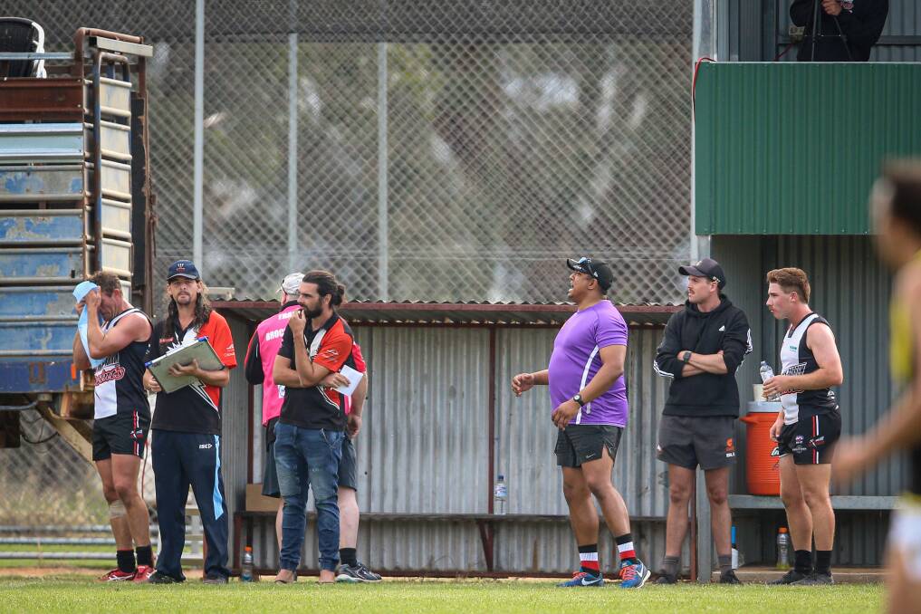FREE TO PLAY: Damian Cupido (in purple, third from right) can take his place
for Brock-Burrum in Saturday's round two clash against Holbrook
after working the bench last week. Picture: JAMES WILTSHIRE