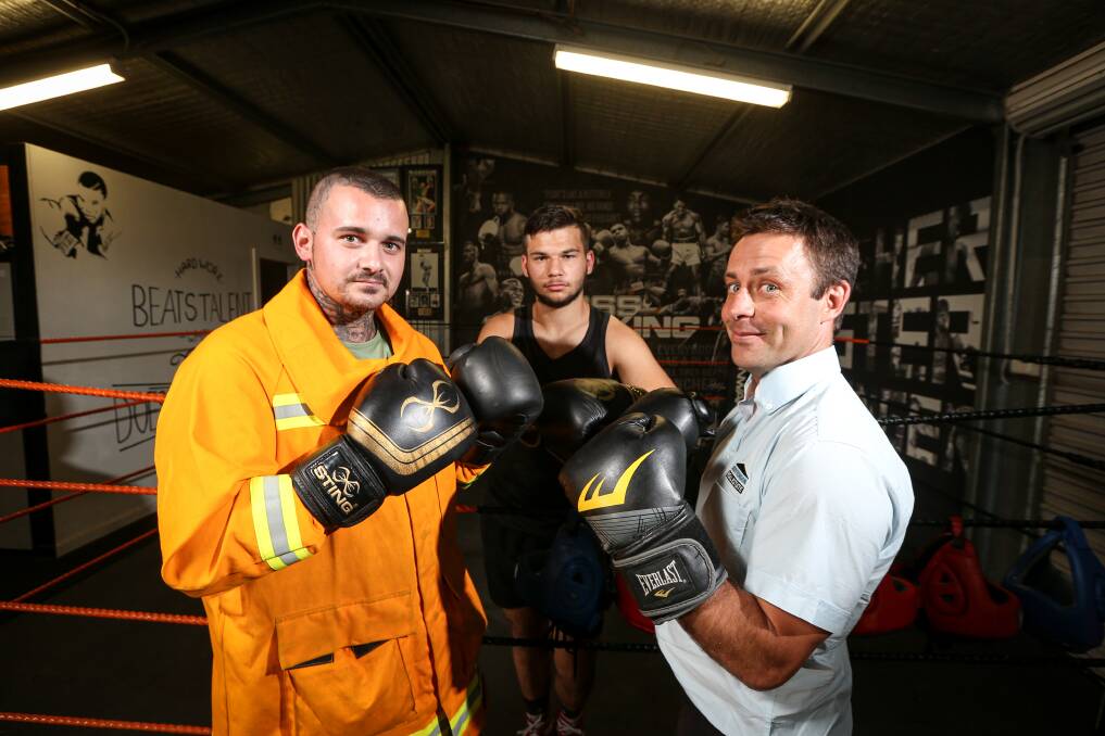 THE EYES HAVE IT: The look on Clint Gilson (right) says it all ahead of his boxing debut against Jesse Payne (left), while George Webb-Rose will have his 20th bout. Picture: JAMES WILTSHIRE 