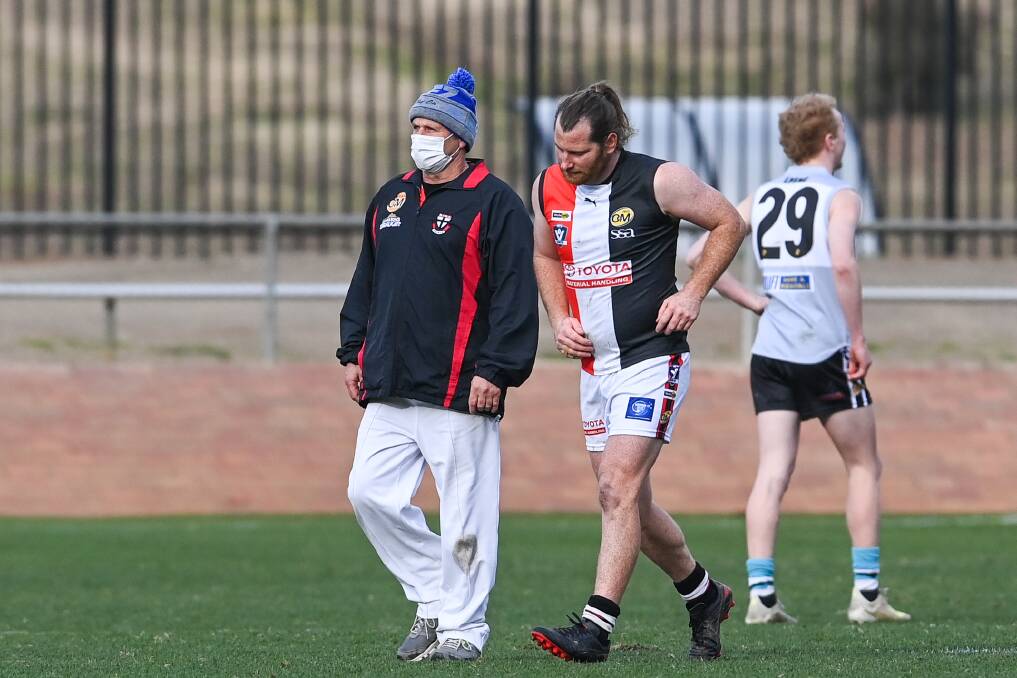 NOT AGAIN: There's no more courageous player than Nathan Laracy but in his second game back from a break, he limped off. Picture: MARK JESSER