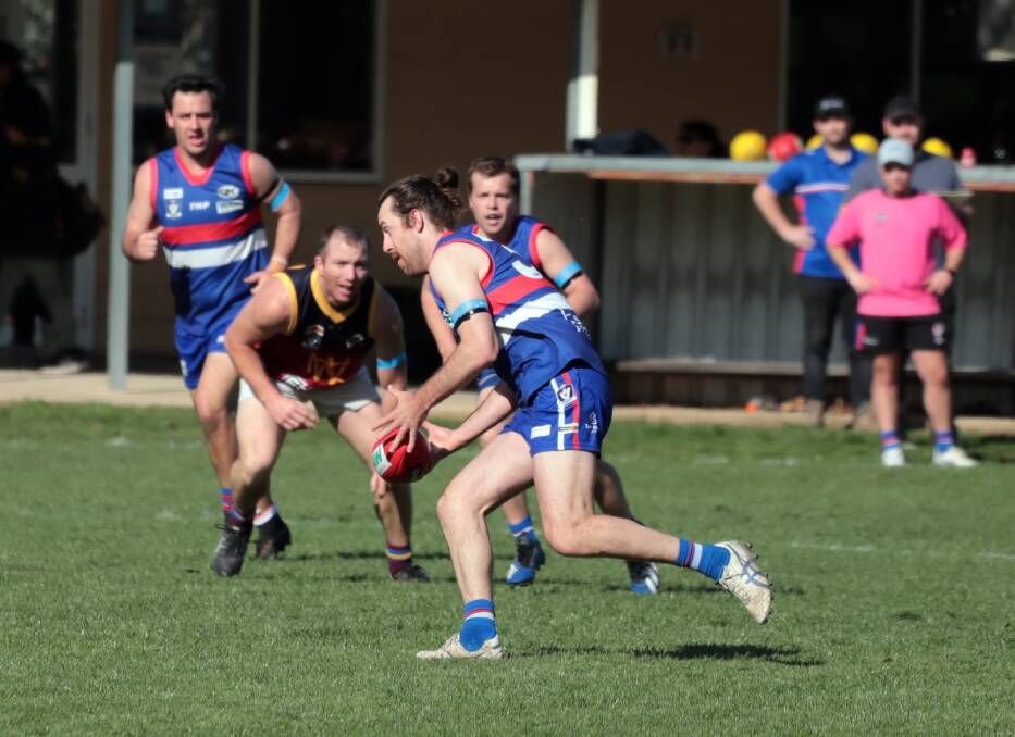 Damon Hansen looks to launch an attacking raid for Tarrawingee. Hansen will again be joined by his brother, former North Melbourne defender Lachie.