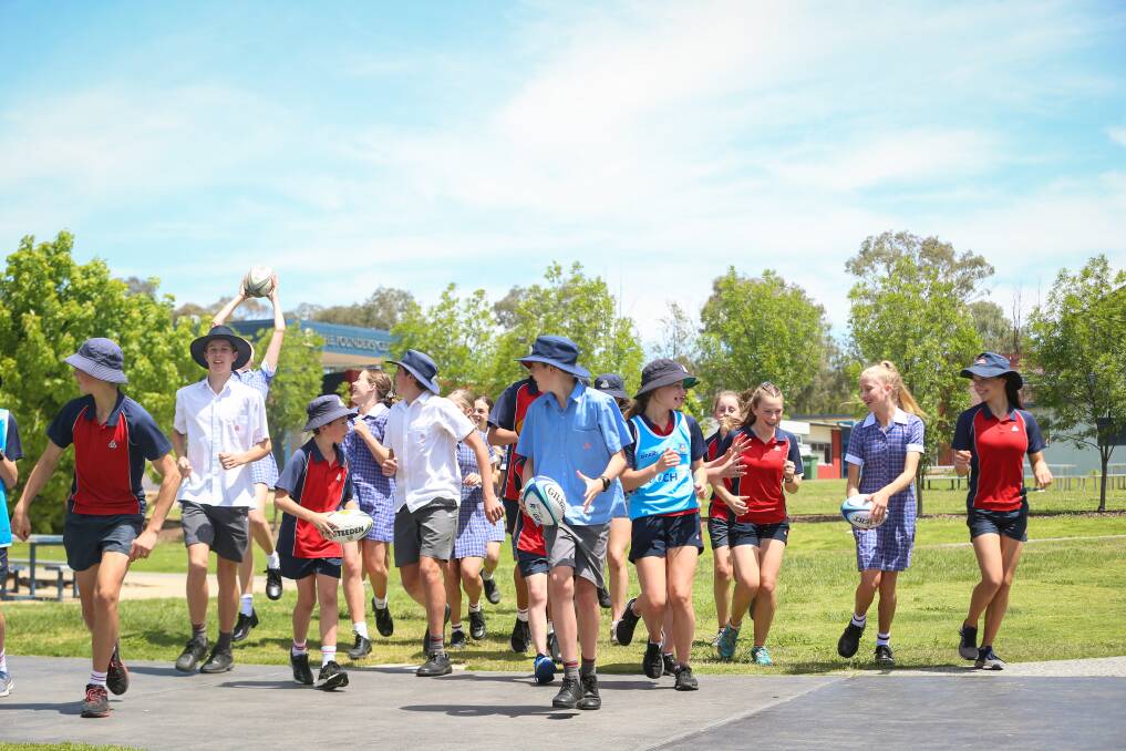 SCHOOL'S OUT: At least it will be on Wednesday nights when Trinity Anglican College students, among other players, contest Touch 7s Rugby. Picture: JAMES WILTSHIRE