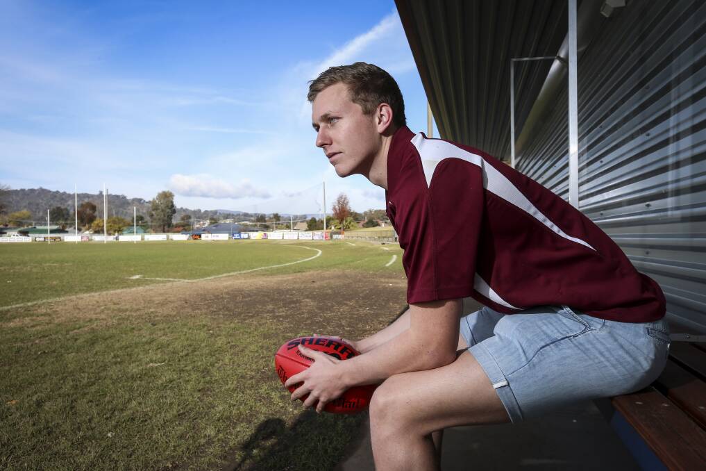 GUTSY EFFORT: Wodonga's Nick English suffered an injury to his 'good' shoulder against North Albury, but elected to play. Picture: JAMES WILTSHIRE