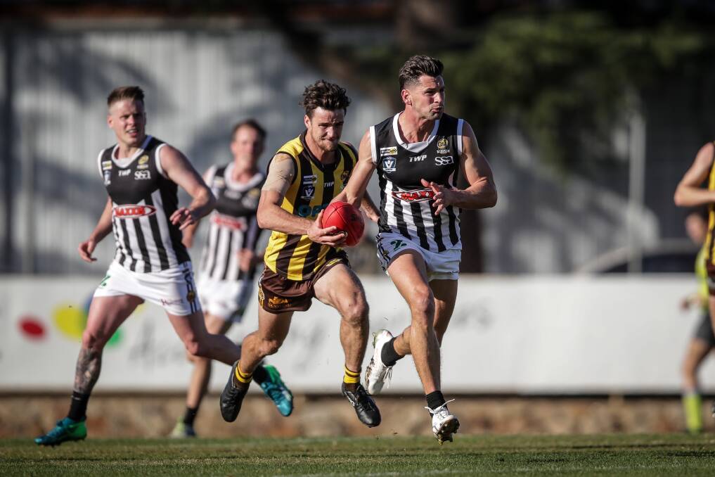 Wangaratta's Mat Grossman powers away against Rovers, but it was the underdogs who led when it counted with an eight-point win.
