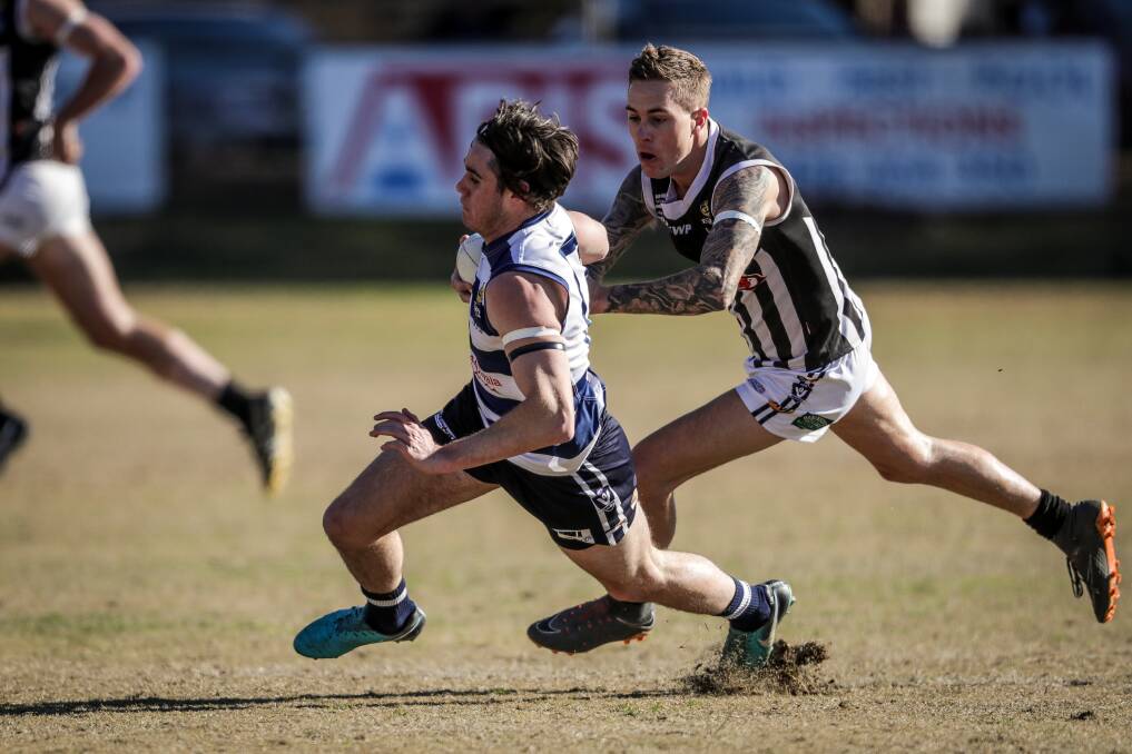 Yarrawonga's Logan Morey tries to burn off his Wangaratta opponent Mitch Jensen in his last season in the O and M in 2018. Morey is returning to the Pigeons after two and a half years away.