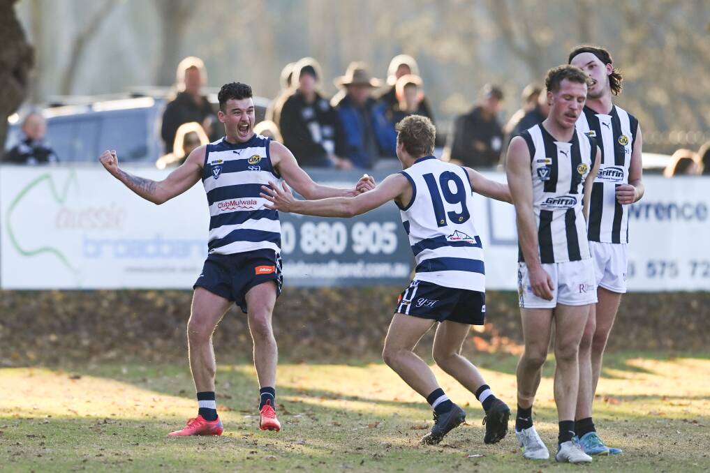 YOU BEAUTY Pigeon Bailey Frauenfelder (left) celebrates with Jess Koopman after kicking his finest goal of the match late against Wangaratta. Picture: MARK JESSER