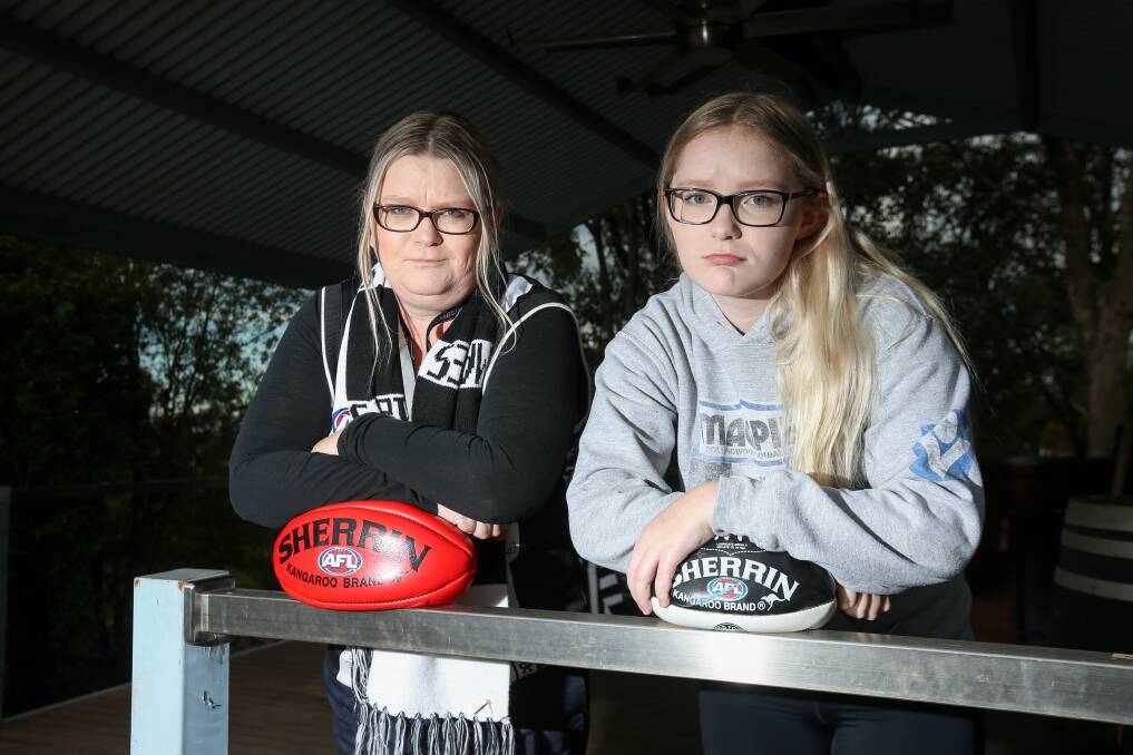 MISS YOU: Passionate Collingwood fans Brenda Seckold and her daughter, Sarah, are pining for footy to return. Picture: TARA TREWHELLA