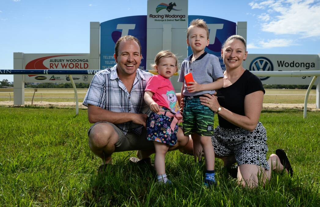 FAMILY FUN: Craig Widdison is back home after 20 years away in the racing industry, with his wife Kelly and children Skyla, 2, and Bailey, 4.