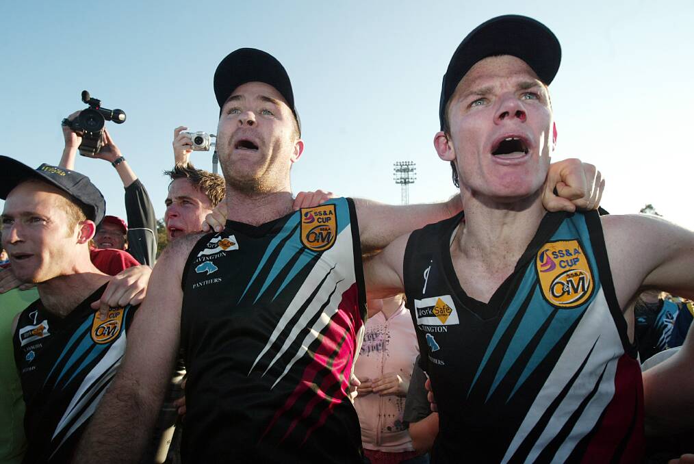 Panthers' Lachie Boyd (left), Brett Sanson and Todd Brown belt out the club songs moments after pipping the Saints by a point in a crackerjack contest.