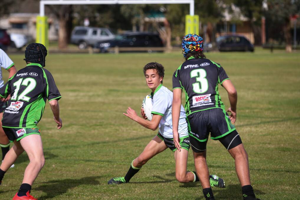 Patrick Byrnes tries to beat his opponent with a step last Saturday, The Albury Junior Rugby League had special permission to play from the NSW Government and Group 9.