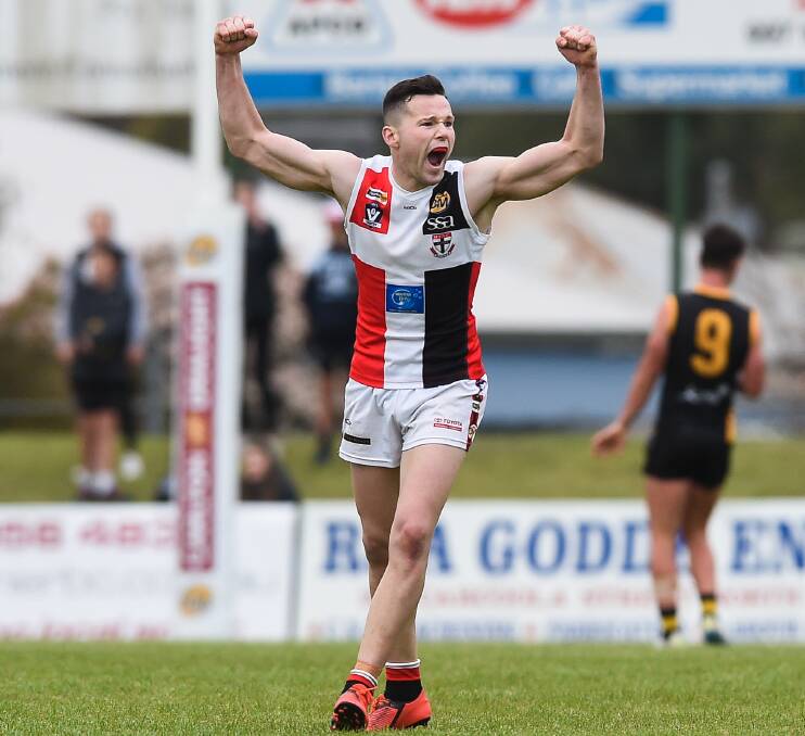 OH YEAH: Myrtleford's Lachie Dale celebrates the siren sounding in the club's upset seven-point first semi-final win over powerhouse Albury. Pictures: MARK JESSER