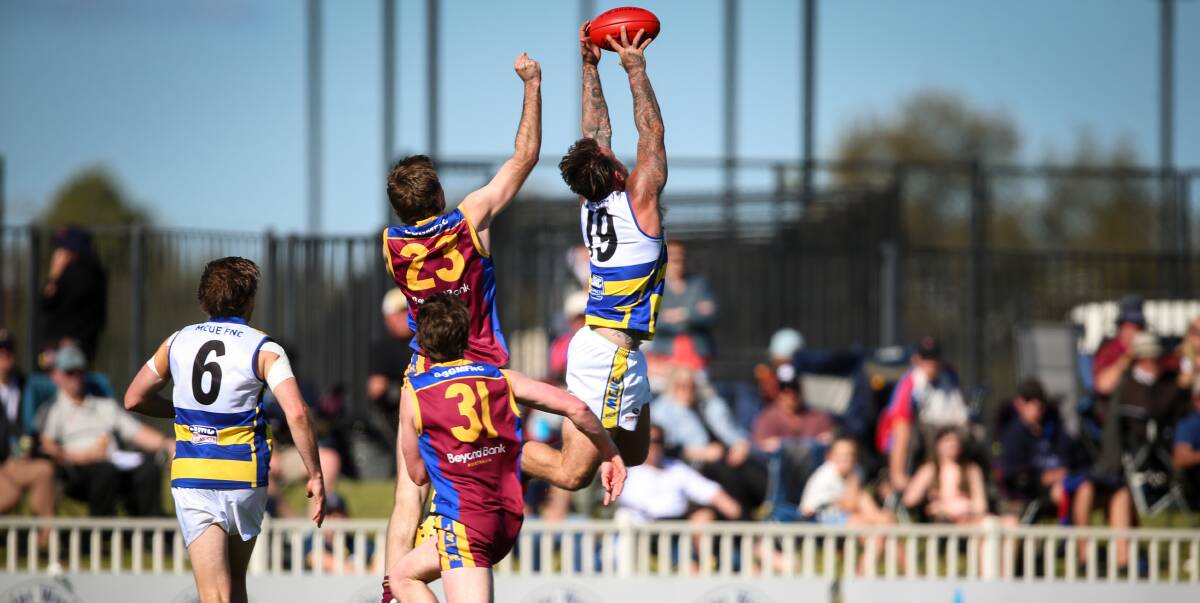 Trent Castles takes a flying mark for the Goannas in last year's finals series against Ganmain Grong Grong Matong in AFL Riverina Championship.
