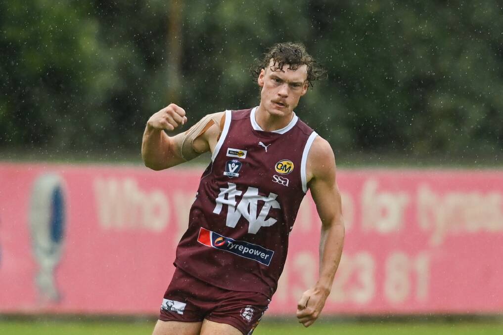 TALENT TIME: Rhys Ritchie was scheduled to captain Barnawartha Chiltern in a cricket final, but the washout allowed him to play for Wodonga and celebrate a goal. Picture: MARK JESSER