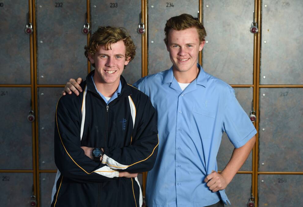 SCHOOL'S OUT: Dylan Clarke (left) will debut for Wodonga Raiders
against North Albury, just a week after his older brother Hayden
played his first game. Picture: MARK JESSER