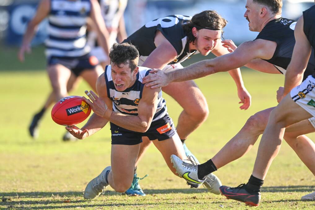 Yarrawonga's Nick Fothergill clears the ball against Wangaratta. Picture: MARK JESSER