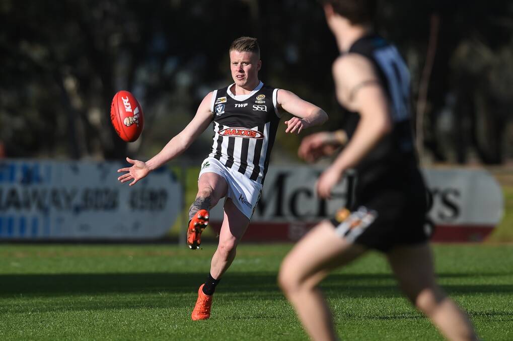 Wangaratta's Mark Anderson is a thumping kick and that proved crucial as the Pies tried to clear the ball from defence against the howling wind. Picture: MARK JESSER