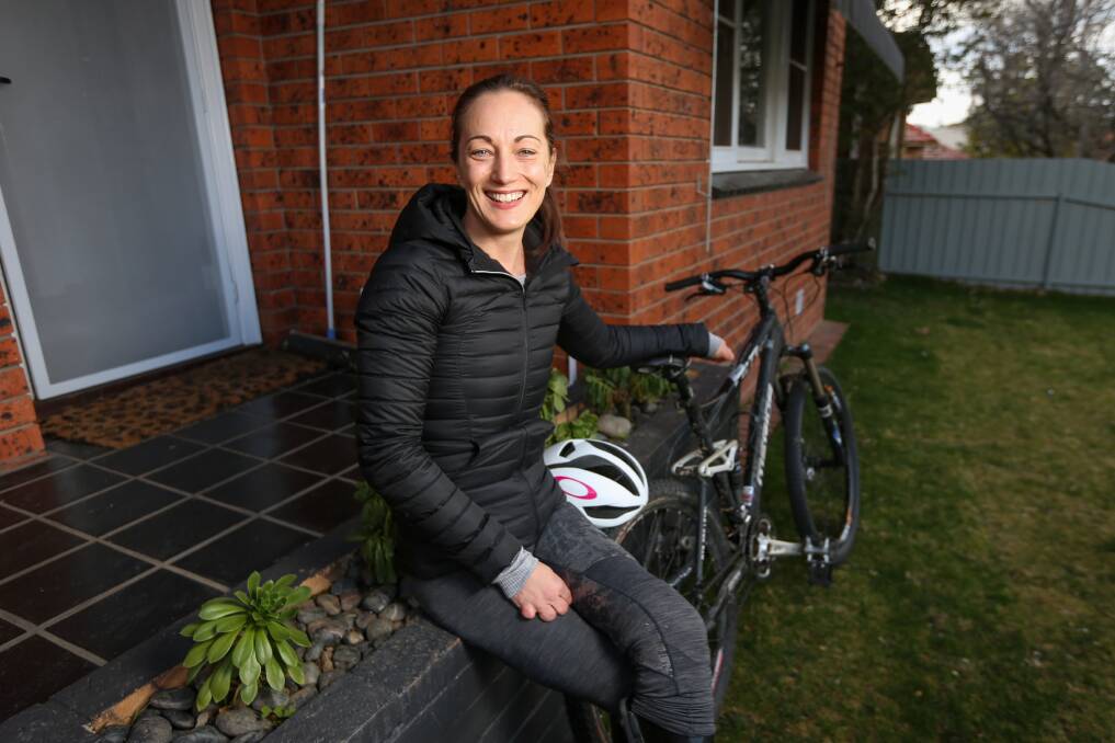 HAPPY DAYS: Para athlete Eliza Ault-Connell went for her first bike ride since the late 1990s after losing her legs to meningococcal disease as a teenager. Picture: JAMES WILTSHIRE