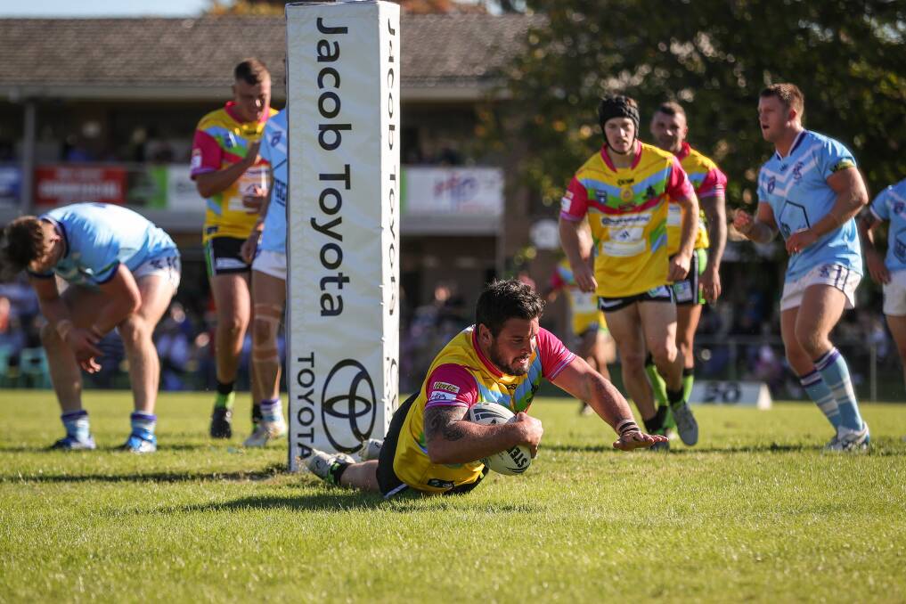 TRY TIME: Albury Thunder assistant coach Jon Huggett scores the club's first try for the season, but it wasn't enough against Tumut. However, it was the club's first competition game with a host of new faces, so it will take time to gel. Picture: JAMES WILTSHIRE 