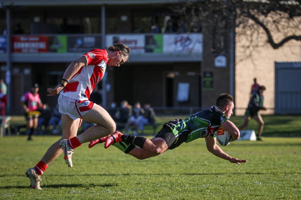 TRY TIME: Albury Thunder's James Olds scores the team's first try in the heavy loss to Temora yesterday. Picture: JAMES WILTSHIRE