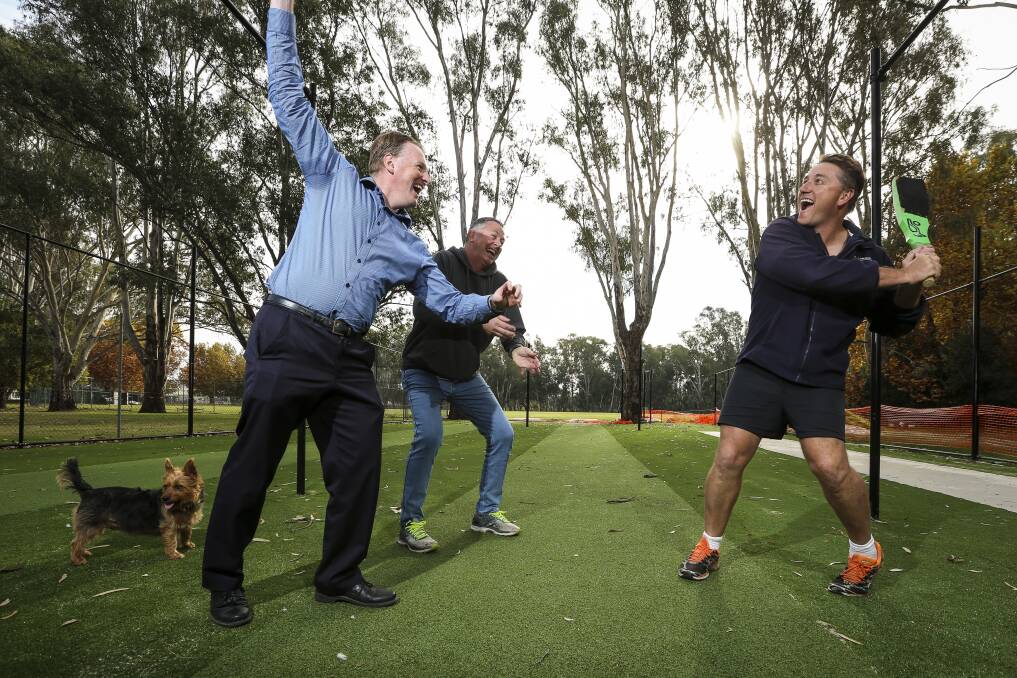 FUN TIMES: Corowa cricket officials Shane Norman (left), Mark Tidd and Paul Lavis ham it up with the club now part of Cricket Albury-Wodonga. Picture: JAMES WILTSHIRE.