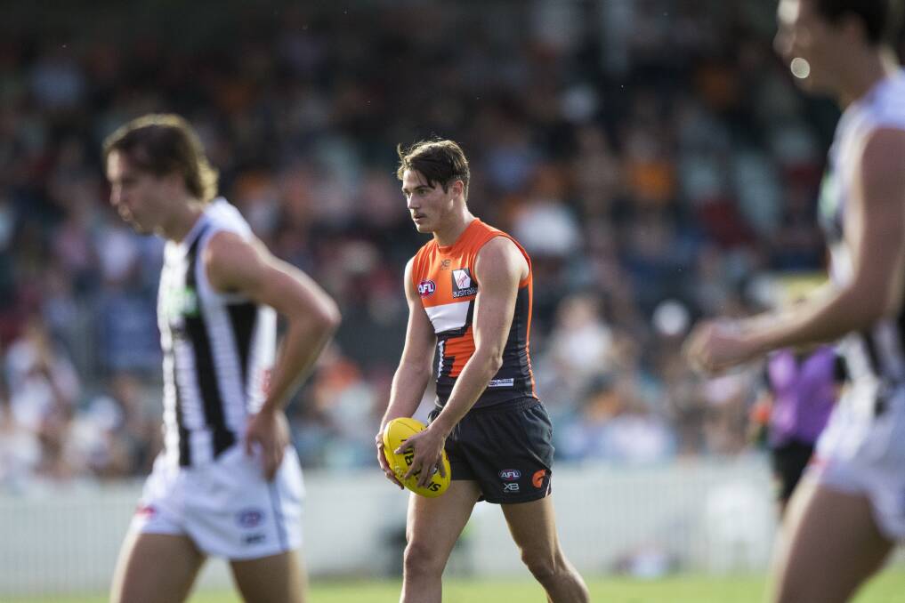 Lachie Tiziani playing for GWS in a pre-season game against Collingwood in 2018, just prior to his knee injury.