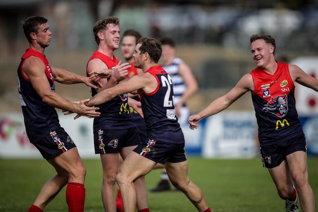 Brodie Filo is congratulated after kicking one of his three blistering goals in the second term against Yarrawonga. Picture: JAMES WILTSHIRE