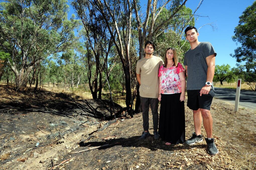 FLASHBACK TO 2018: Senio, Ashleigh and Isaiah Tuala visit the car crash site on Holbrook road to consider what might have been. 
