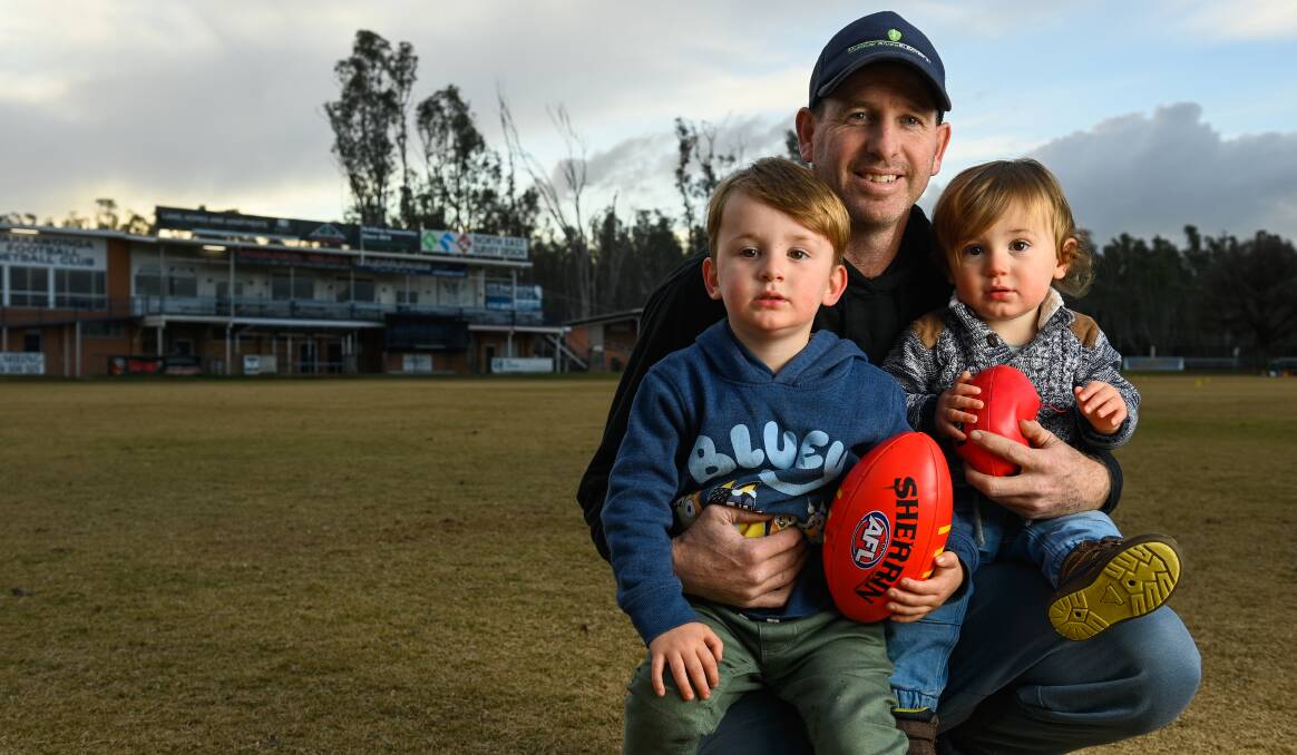 FAMILY MAN: Craig Ednie with his two boys Harvey, 2, and Boston, 1. Picture: MARK JESSER