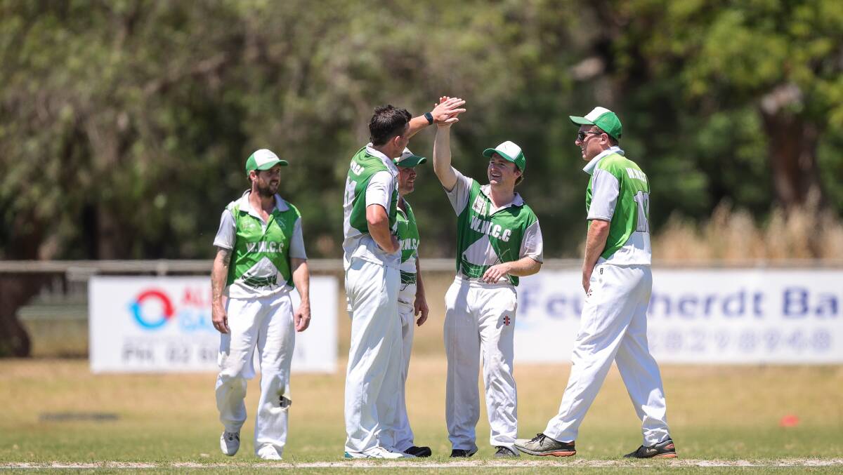 The Hoppers celebrate the wicket of Riley Knobel who was bowled by Mitch Lauritzen for two. Picture James Wiltshire