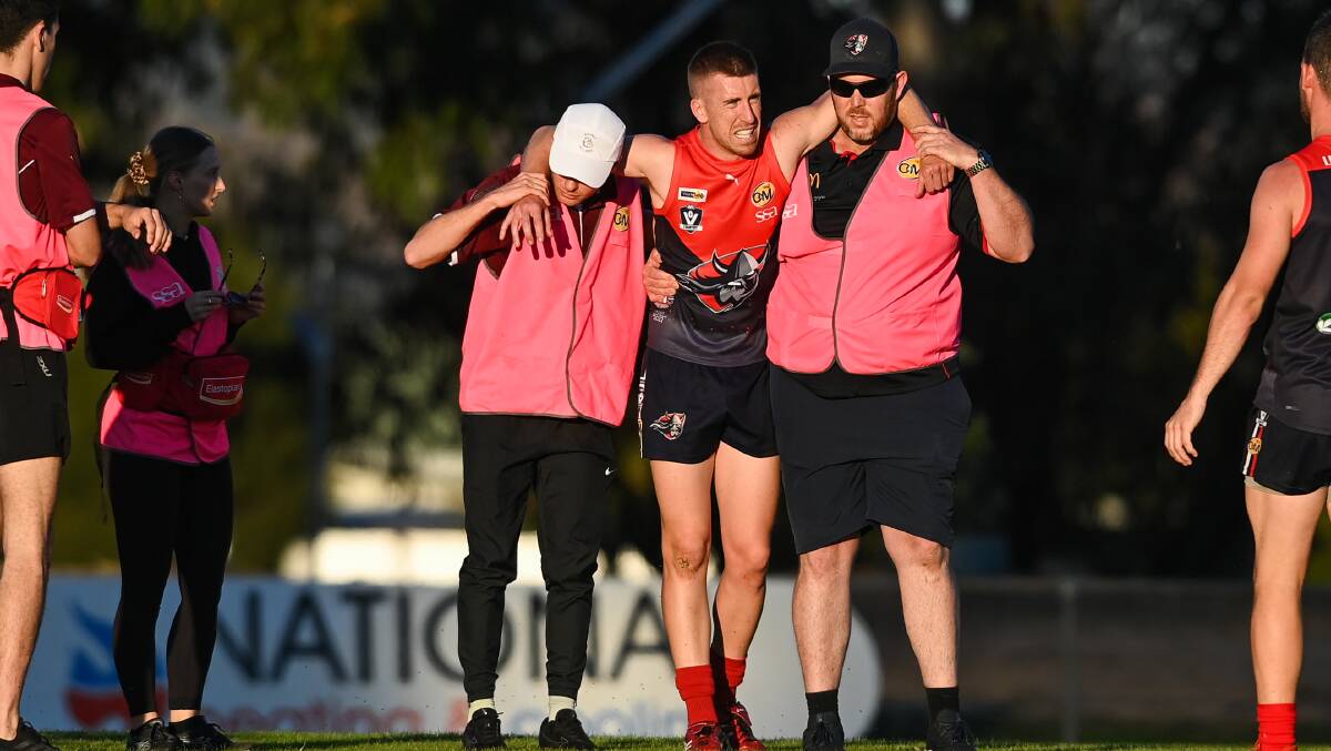 Wodonga Raider Shane Munro had to be helped from the ground by trainers on Anzac Day.